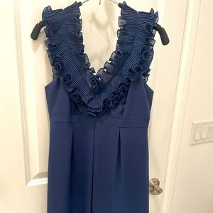 Navy blue cocktail dress with ruffle neckline